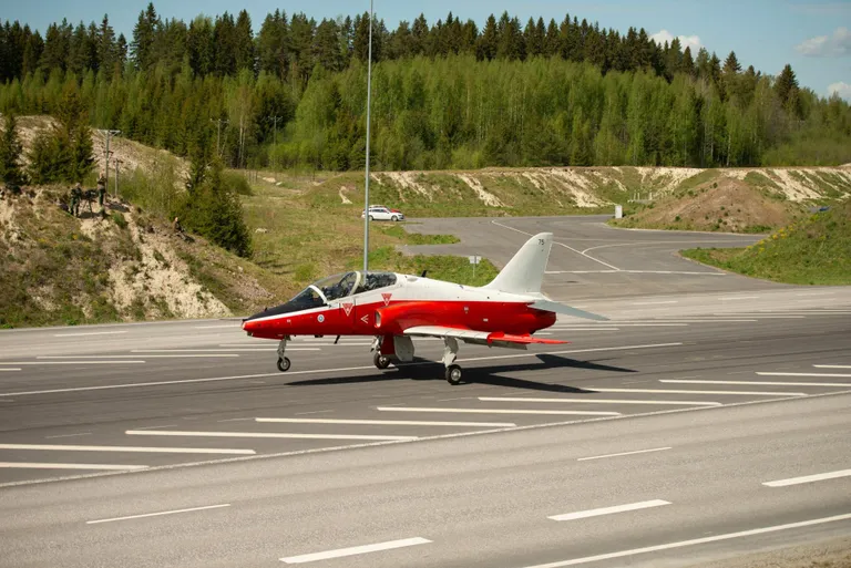A Finnish Hawk at the moment of touching down.