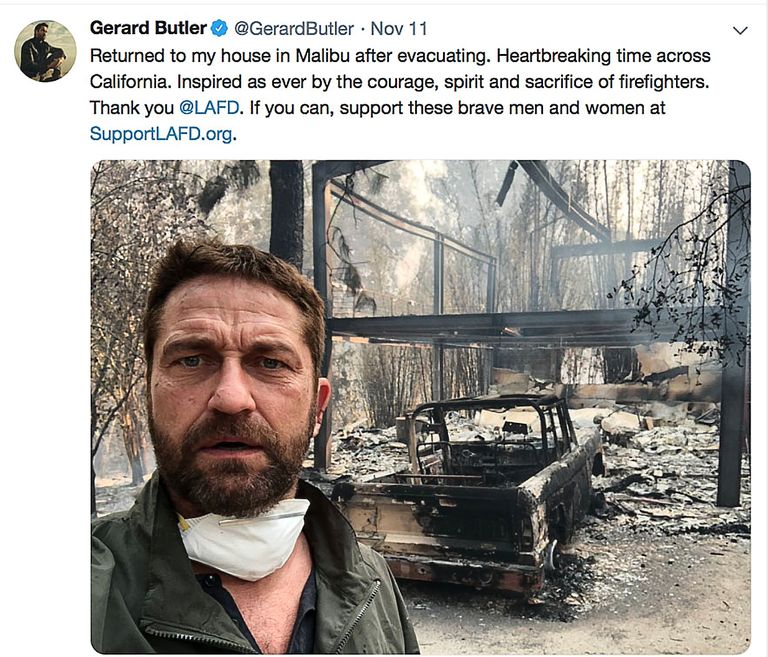 Актер Джерард Батлер на фоне сгоревшего дома.