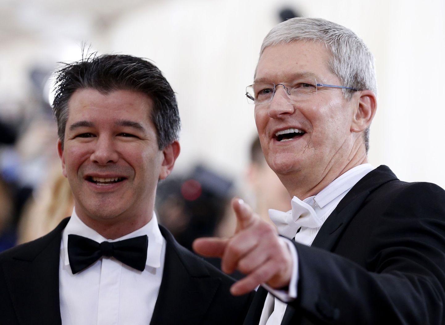 Apple'i juht Tim Cook ja Uberi endine juht Travis Kalanick.