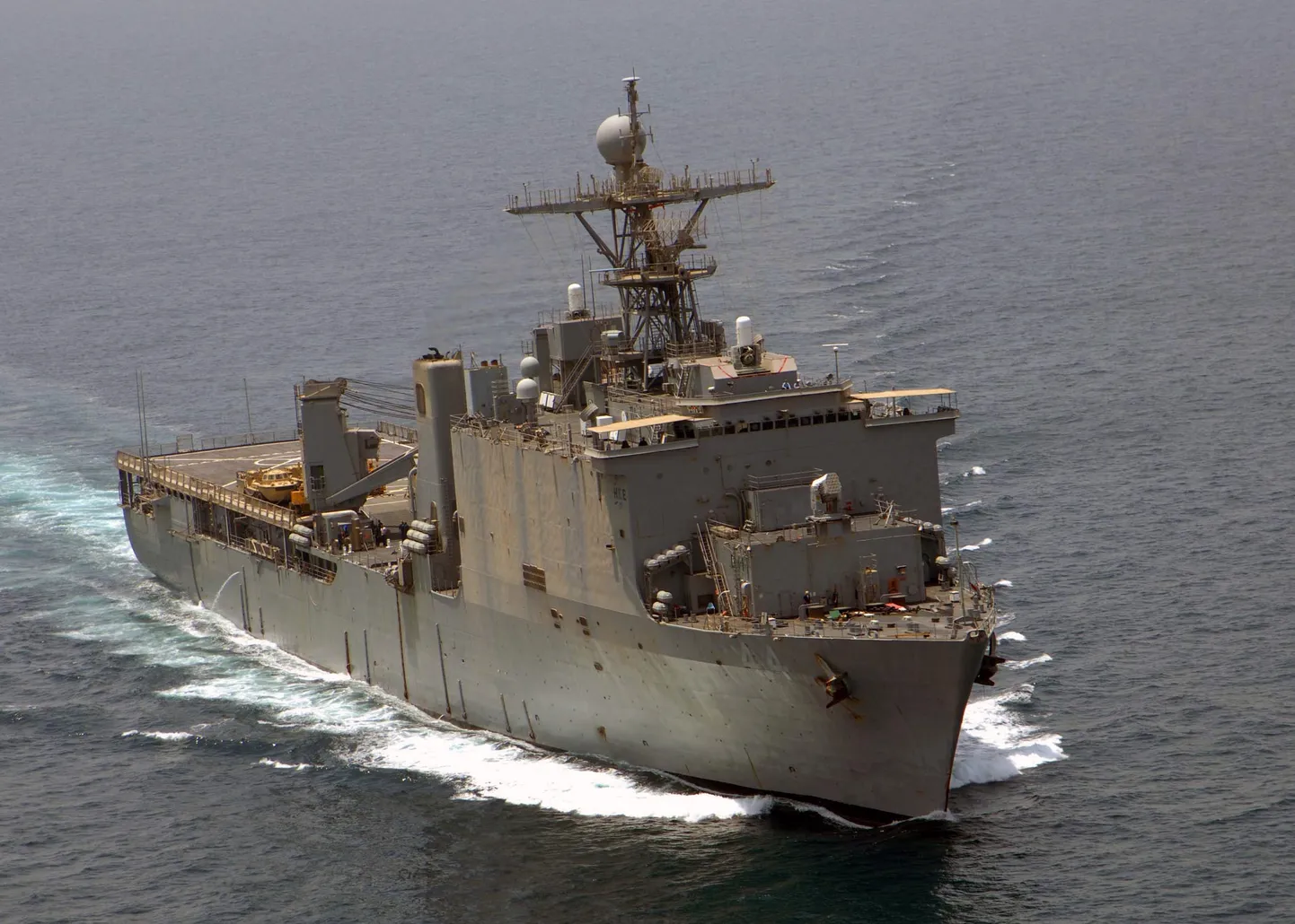 050719-N-5526M-001  Arabian Gulf... The Whidbey Island class amphibious dock landing ship USS Gunston Hall (LSD 44) conducts Surface Action Group (SAG) operations during exercise Nautical Union. Nautical Union is a joint exercise directed through Commander Destroyer Squadron 50 (COMDESRON 50) between the U.S. and Arabian navies. Nautical Union operations include conducting Maritime Security Operations (MSO) training, air defense, anti submarine warfare, surface warfare, mine counter measures, electronic warfare, replenishment at sea (RAS), and command and control. Maritime Security Operations (MSO) set the conditions for security and stability in the maritime environment as well as complements the counter-terrorism and security efforts of regional nations. MSO deny international terrorists use of the maritime environment as a venue for attack or to transport personnel, weapons, or other material. 
U.S. Navy Photo by Photographers Mate 1st class Robert R. McRill, USN.