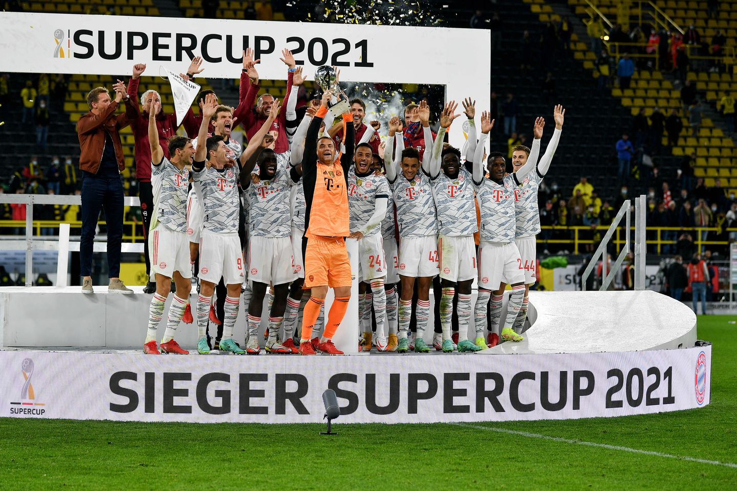 DORTMUND, Aug. 18, 2021  Members of Bayern Munich celebrate during the awarding ceremony after the German Supercup football match between Borussia Dortmund and FC Bayern Munich in Dortmund, Germany, Aug. 17, 2021. (Photo by Ulrich Hufnagel/Xinhua) (Credit Image: Â© Ulrich Hufnagel/Xinhua via ZUMA Press)