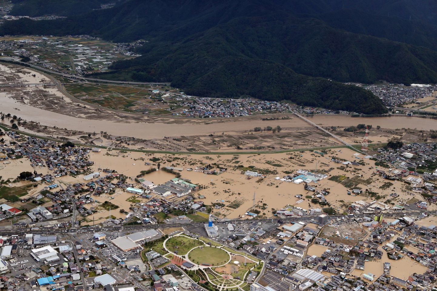 epa07916650 An aerial picture shows floods around Nagano, Nagano prefecture, Japan, 13 October 2019. According to latest media reports, at least nine people have died and more than 10 are missing after powerful typhoon Hagibis hit Japan provoking landslides and rivers overflowing across the country.  EPA/JIJI PRESS JAPAN OUT EDITORIAL USE ONLY/  NO ARCHIVES