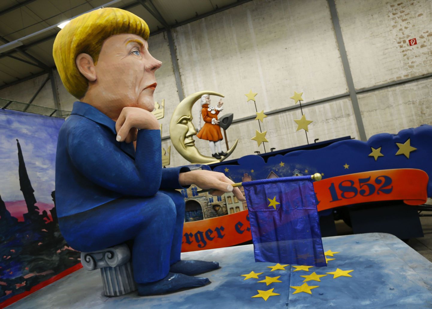 Saksamaa kantslerit Angela Merkelit kujutav karikatuurne skulptuur