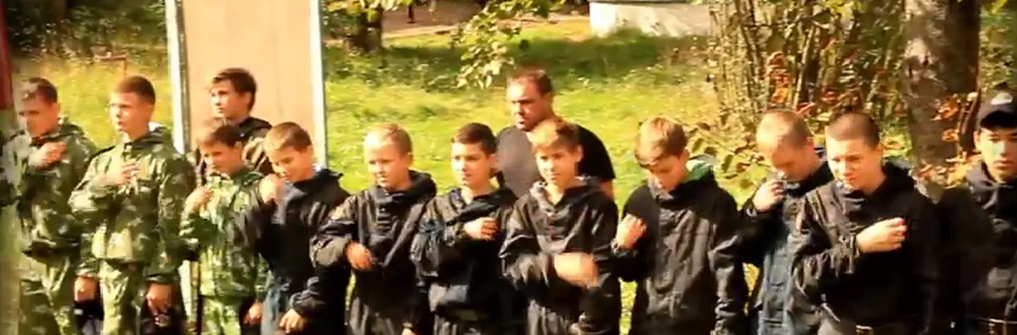 Kuvatõmmis E.N.O.T. CORP videost.