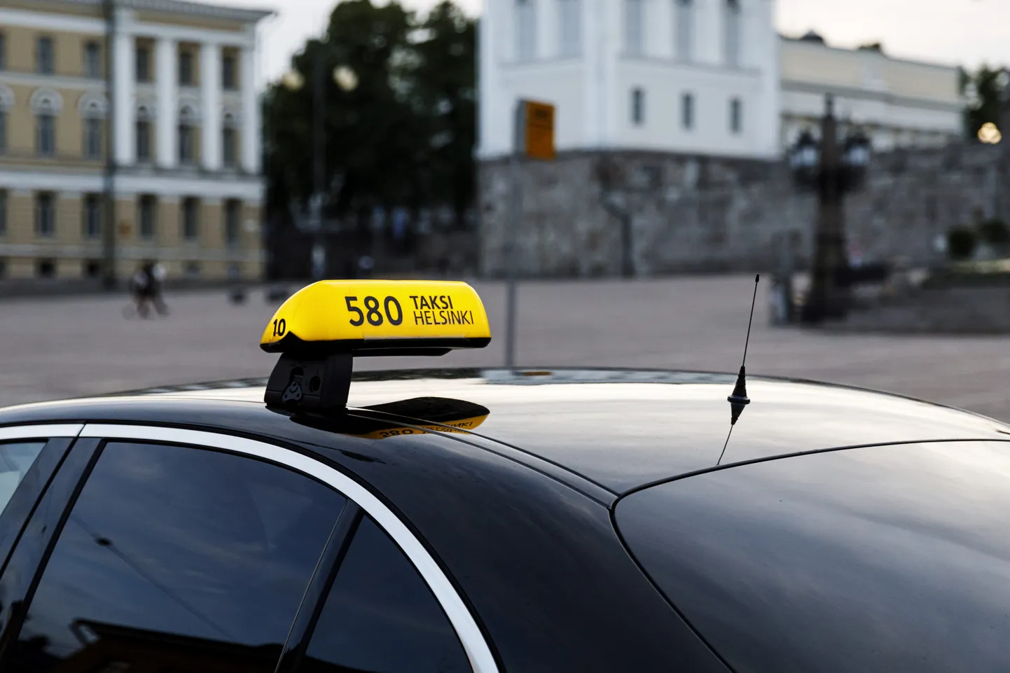 A taxi is seen in the Helsinki Senate Square