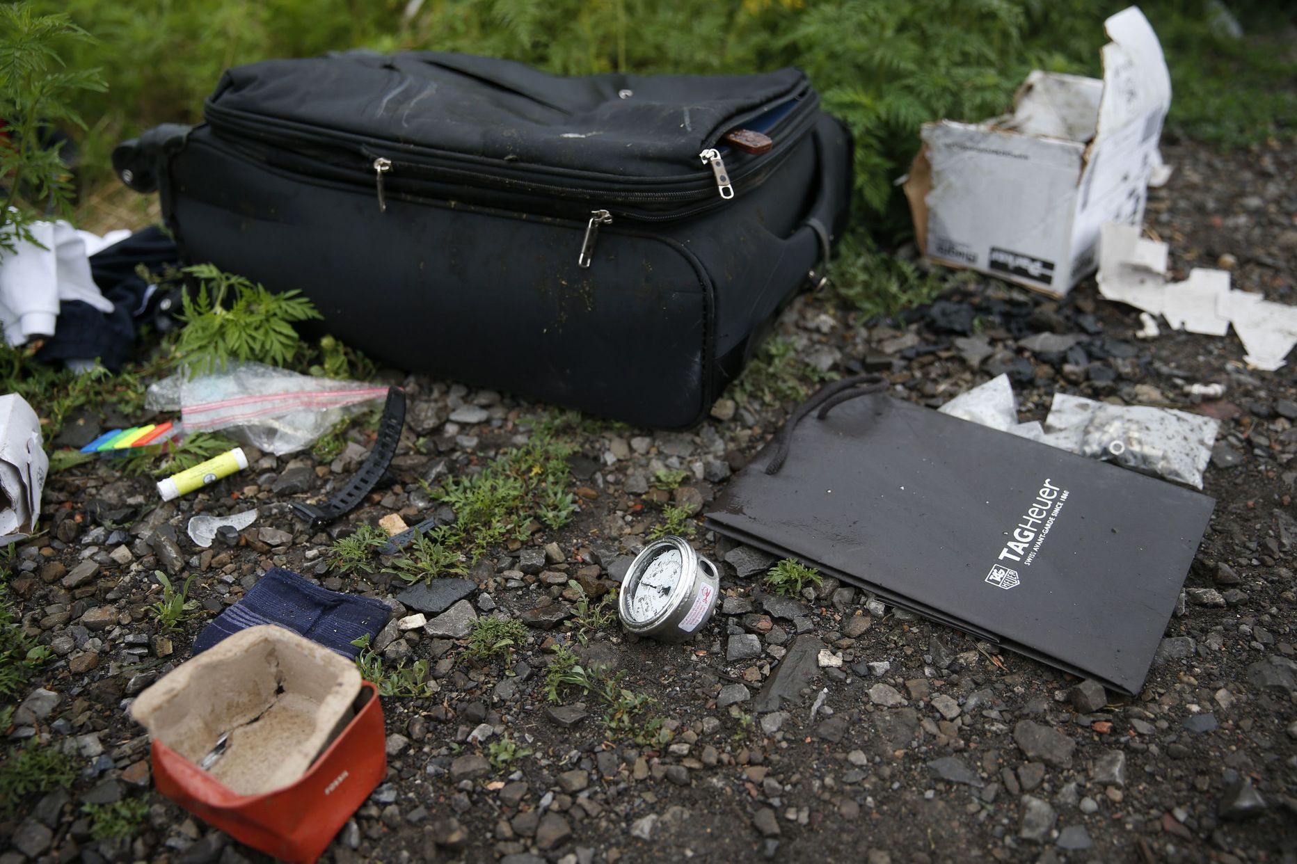 Malaysia Airlines lennuõnnetuse ohvri kohver ja isiklikud asjad