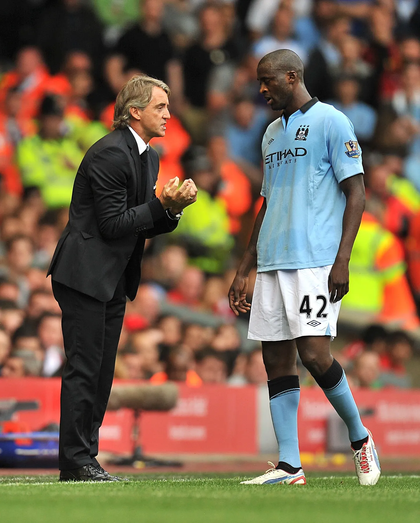 Roberto Mancini (vasakul) ja Yaya Toure.