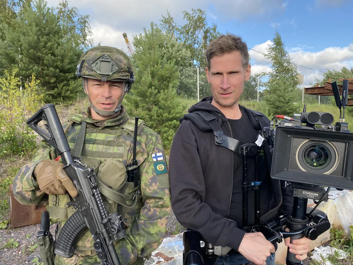 Peter Franzen (left) in the role of Captain Rami Ohrankämmen and cameraman Ants Martin Vahur on the set of Conflict (2024).