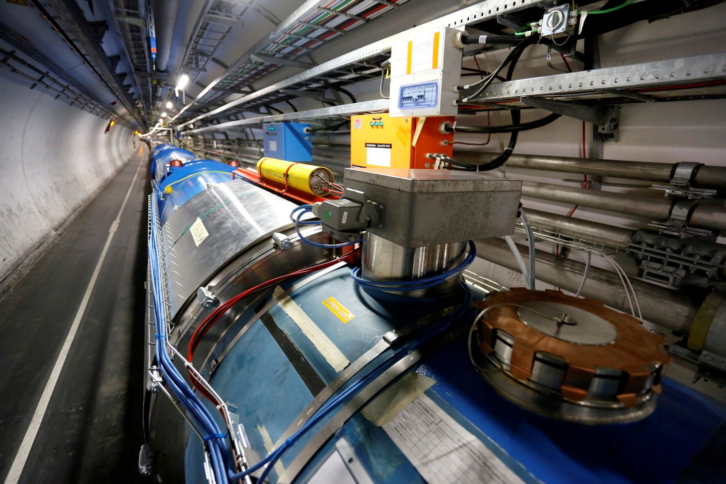 FILE PHOTO: A general view of the Large Hadron Collider (LHC) experiment is seen during a media visit to the Organization for Nuclear Research (CERN) in the French village of Saint-Genis-Pouilly, near Geneva in Switzerland, July 23, 2014. REUTERS/Pierre Albouy/File Photo