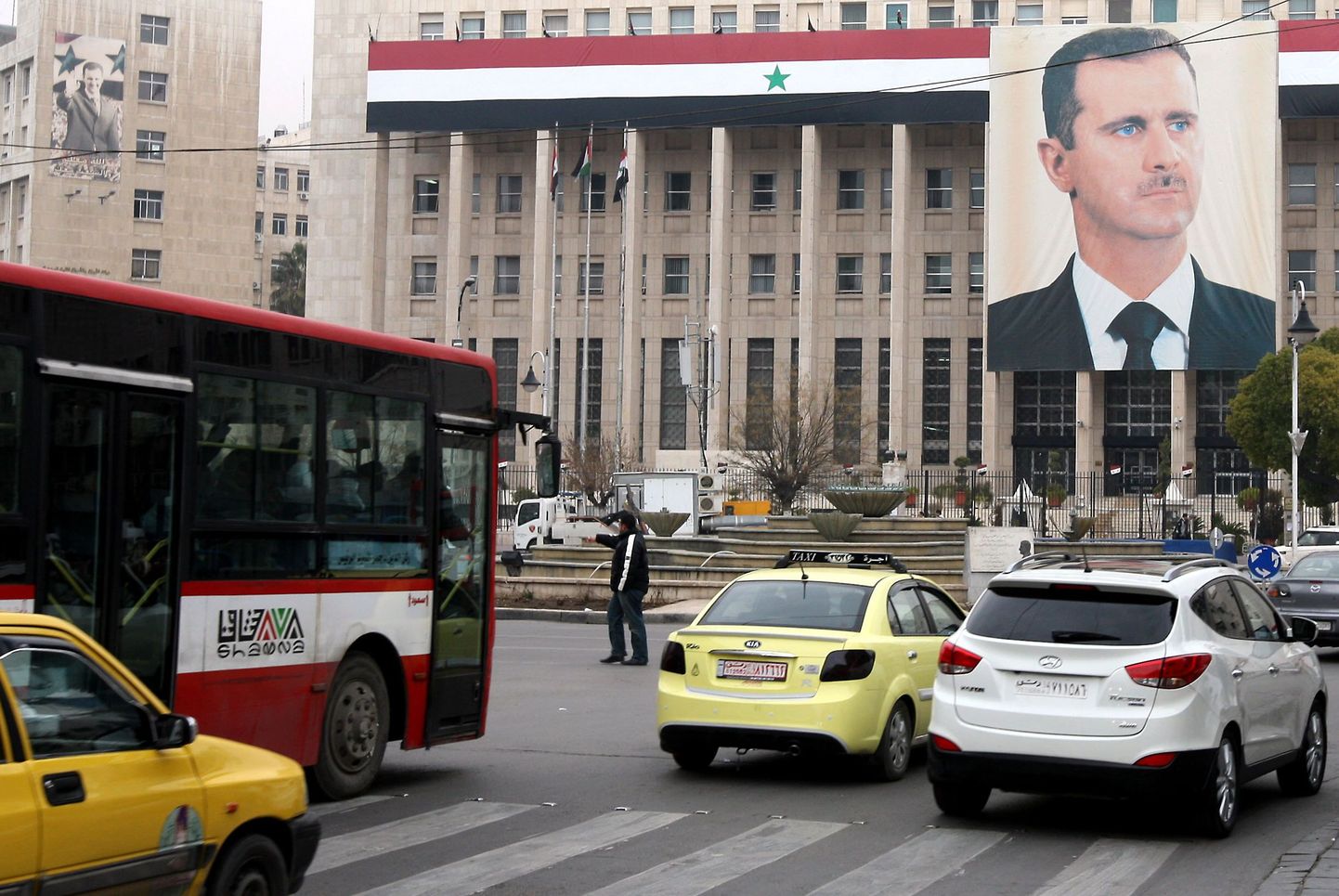 Süüria presidendi Bashar al-Assadplakat Damaskuses.