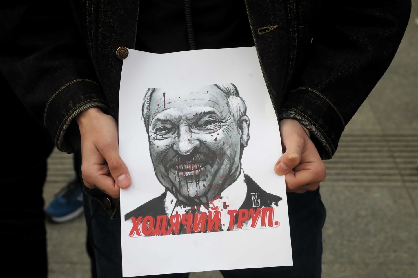 Плакат с изображением Александра Лукашенко.