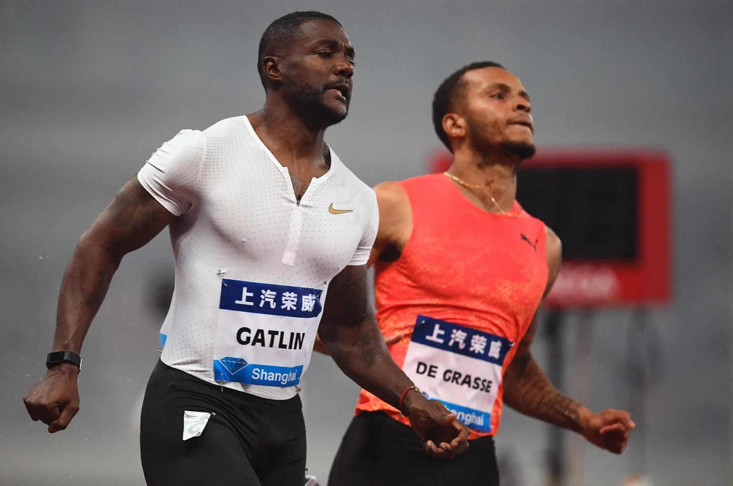Justin Gatlin ja Andre De Grasse.