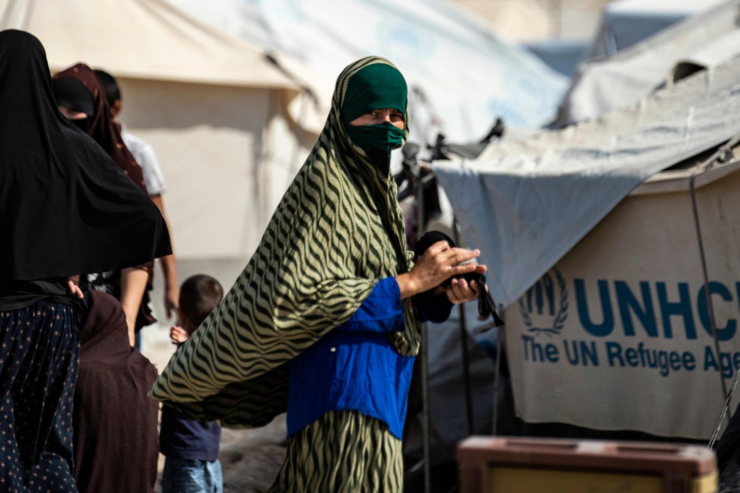 Naine Süüria põhjaosas asuvas al-Holi laagris, kus hoitakse suuremat osa ISISega liitunud välismaalastest naisi.