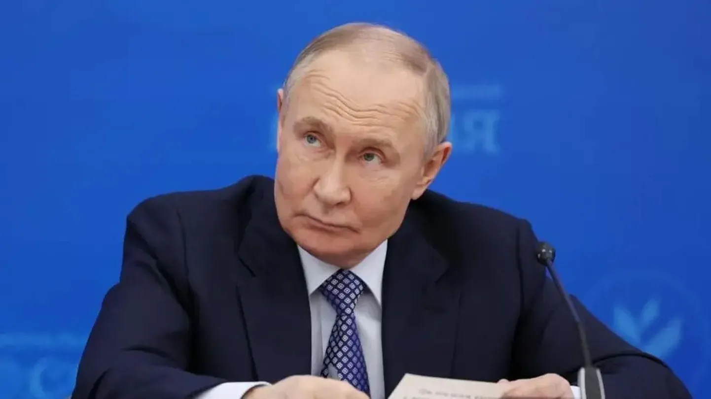 Путин