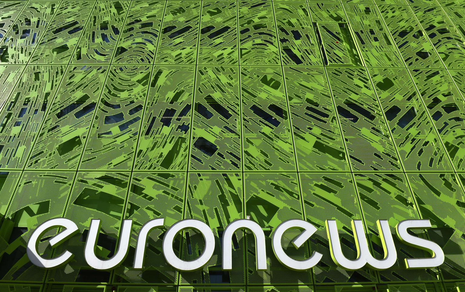 This picture taken on September 30, 2015 shows the TV chanel Euronews new world headquarters at "Confluence" district, in Lyon, southeastern France. The Euronews new building will be inaugurate on October 15, 2015.                                  AFP PHOTO / PHILIPPE DESMAZES