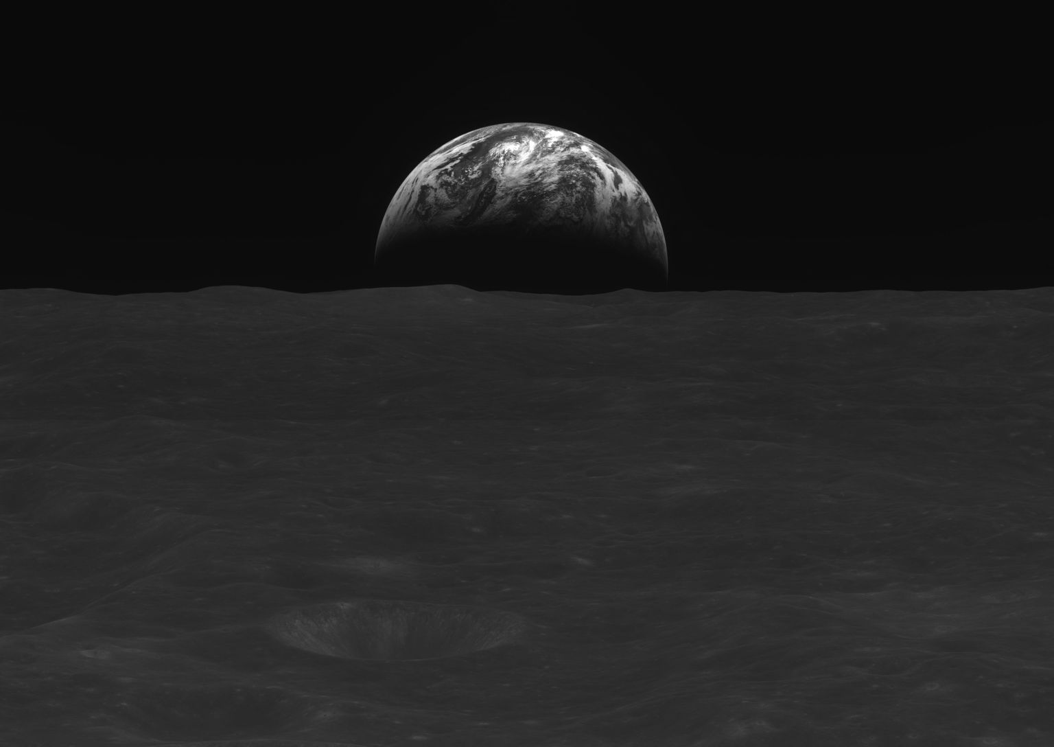 Sel 2022. aasta 31. detsembril tehtud fotol, mille Korea kosmoseuuringute instituut (KARI) 3. jaanuaril avaldas, on näha must-valge kujutis Kuu pinnast ja Maast taustal.