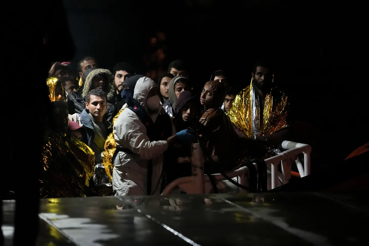 Migrandid Itaalia rannikul. Foto on illustreeriv.