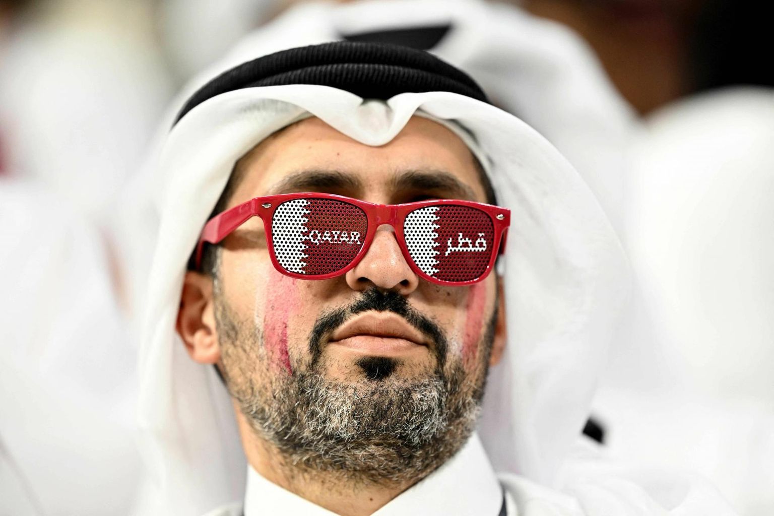 Katari jalgpallikoondise poolehoidja Ecuadori vastu peetud avamängu eel, mil korraldajamaa ootused olid veel laes.