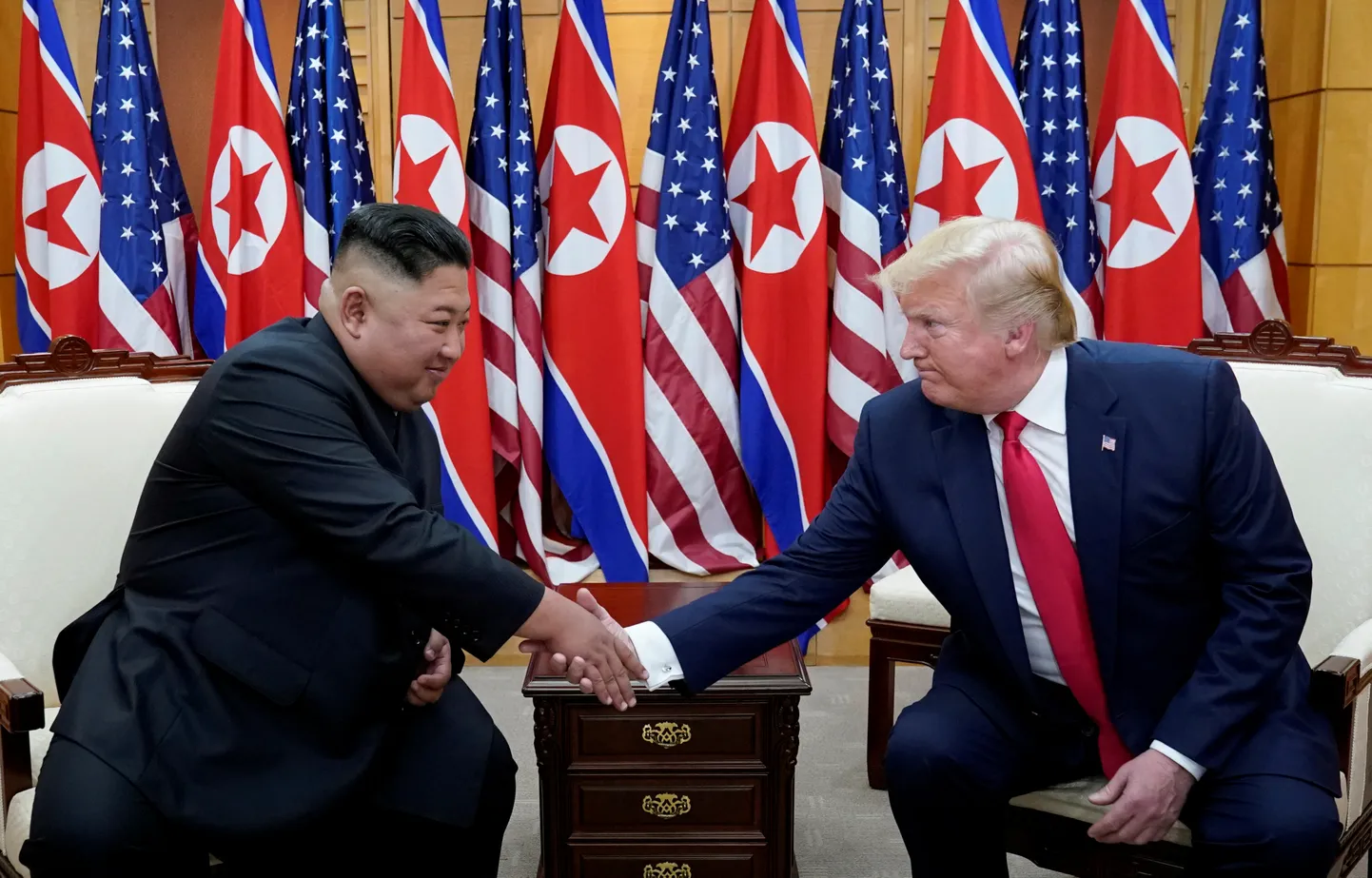 Ким Чен Ын и Дональд Трамп.