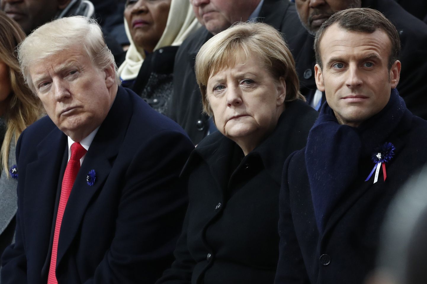 Donald Trump, Angela Merkel ja Emmanuel Macron.