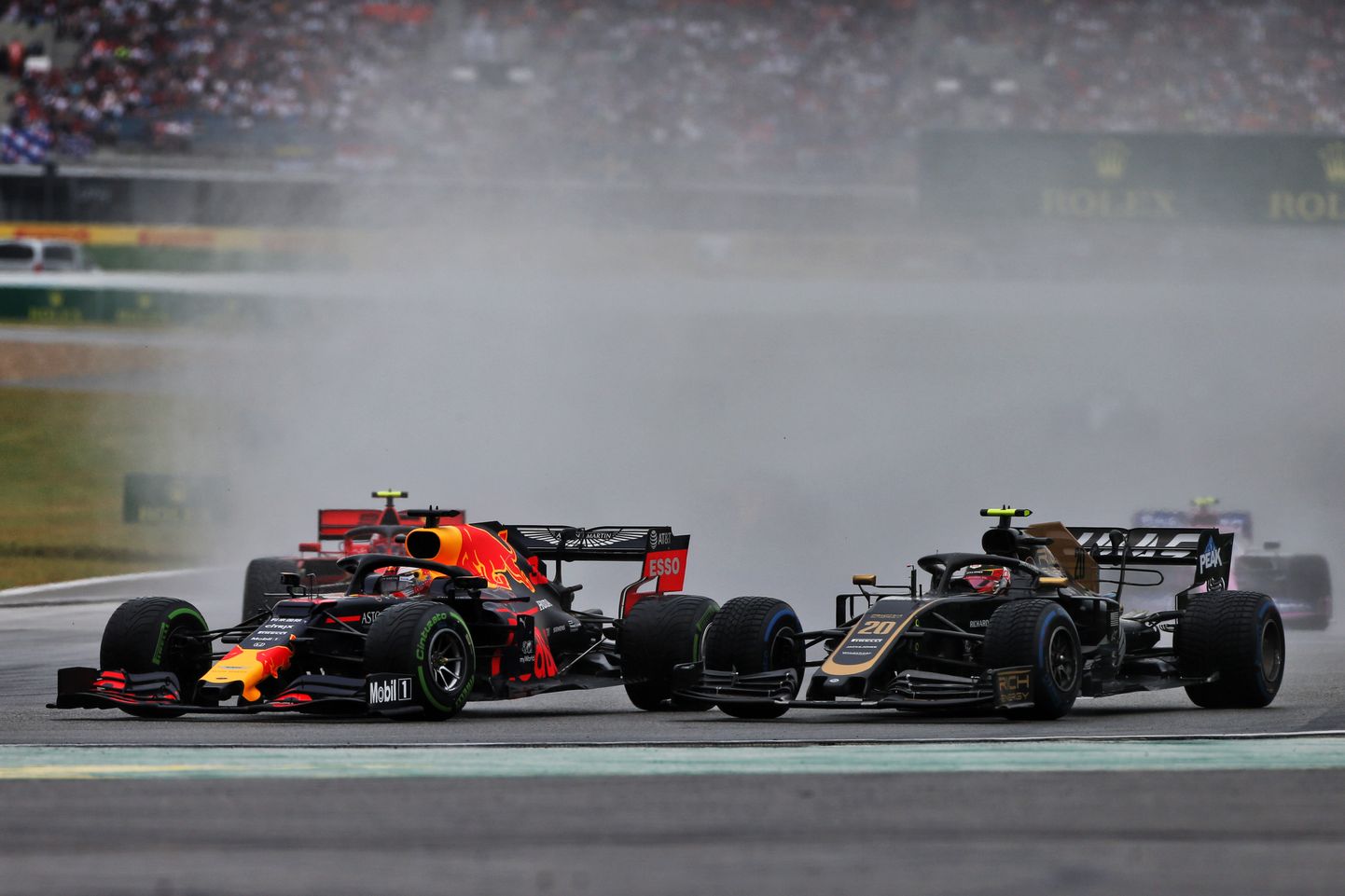 (L to R): Max Verstappen (NLD) Red Bull Racing RB15 and Kevin Magnussen (DEN) Haas VF-19 battle for position.
German Grand Prix, Sunday 28th July 2019. Hockenheim, Germany.