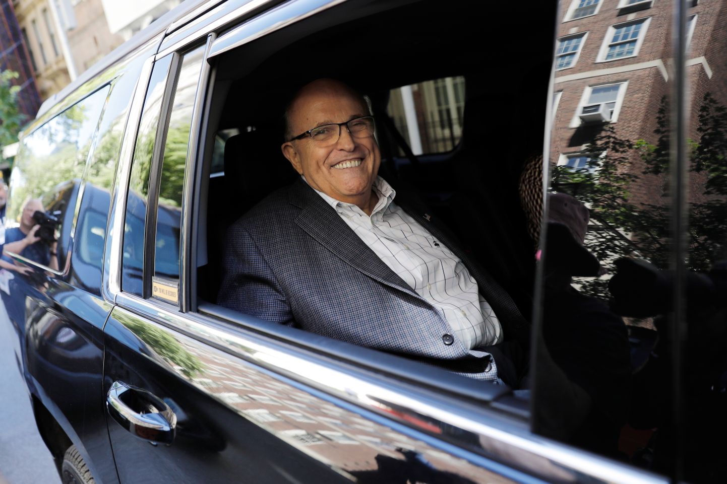 Rudy Giuliani lahkumas oma kodust Manhattanis.