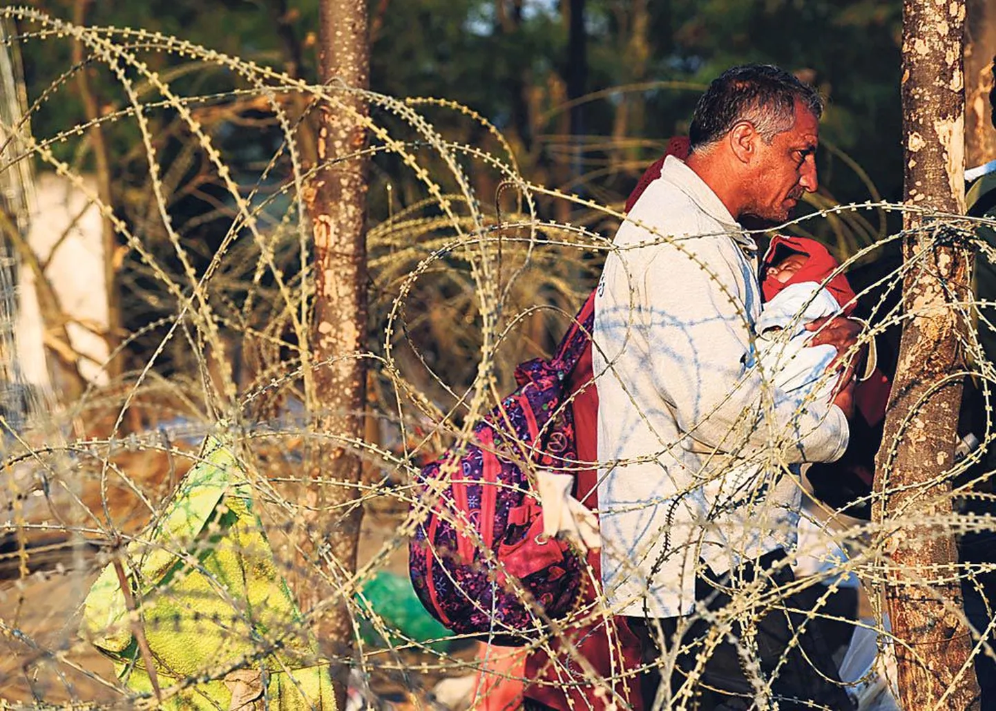 Migrandid ületamas Kreeka-Makedoonia piiri.