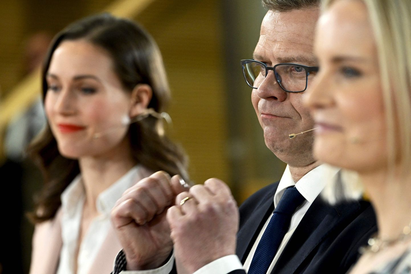 Soome kolme suurima erakonna esimehed (vasakult): Sanna Marin, Petteri Orpo ja Riika Purra, 2. aprillil 2023. a. kampaaniaüritusel.