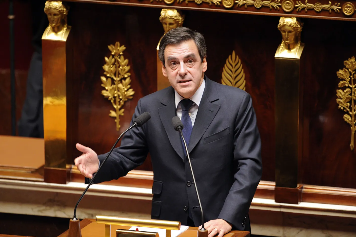 French Prime minister Francois Fillon delivers a speech, on March 17, 2009 at the French National Assembly in Paris, prior to the vote by the French parliament on president Nicolas Sarkozy's decision to bring France back into Nato's military command, more than four decades after it pulled out. Widely viewed as one of Sarkozy's most important foreign policy changes, the move has drawn fire from nationalists and some in his right-wing party who see it as a shift towards a more US-friendly stance. AFP PHOTO BERTRAND GUAY