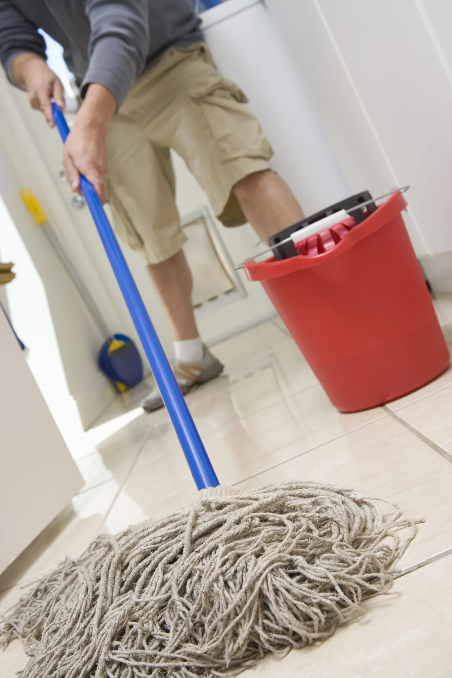 Man mopping floor Royalty free: For comercial usage price on demand