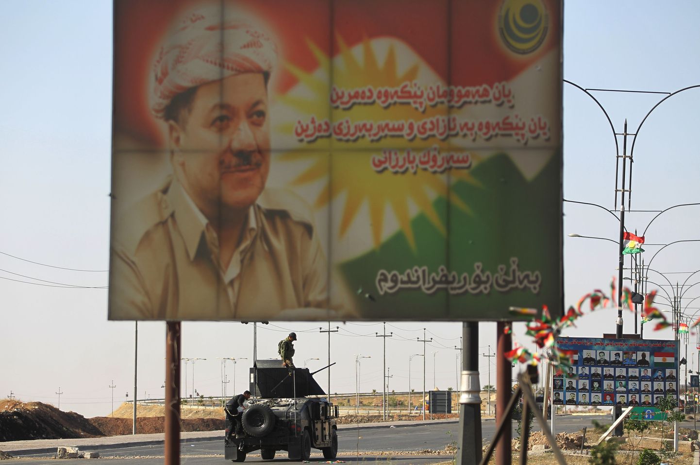 Massud Barzanit kujutav plakat.