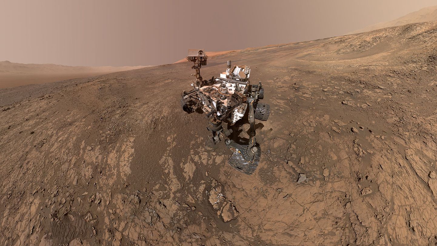 Kunstniku kujutis Curiosity kulgurist Marsi pinnal.