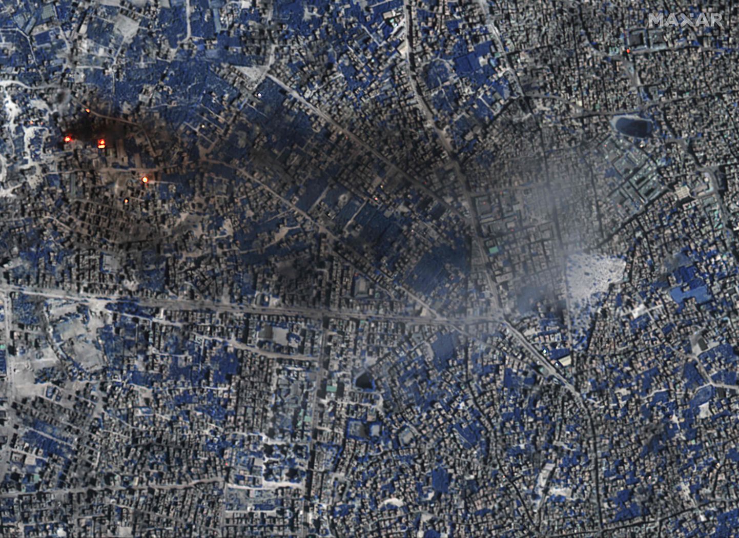 Maxar Technologiesi satelliitpilt näitab tulekoldeid Gaza linnas 7. oktoobril 2023. Sinisena paistab taimkate.