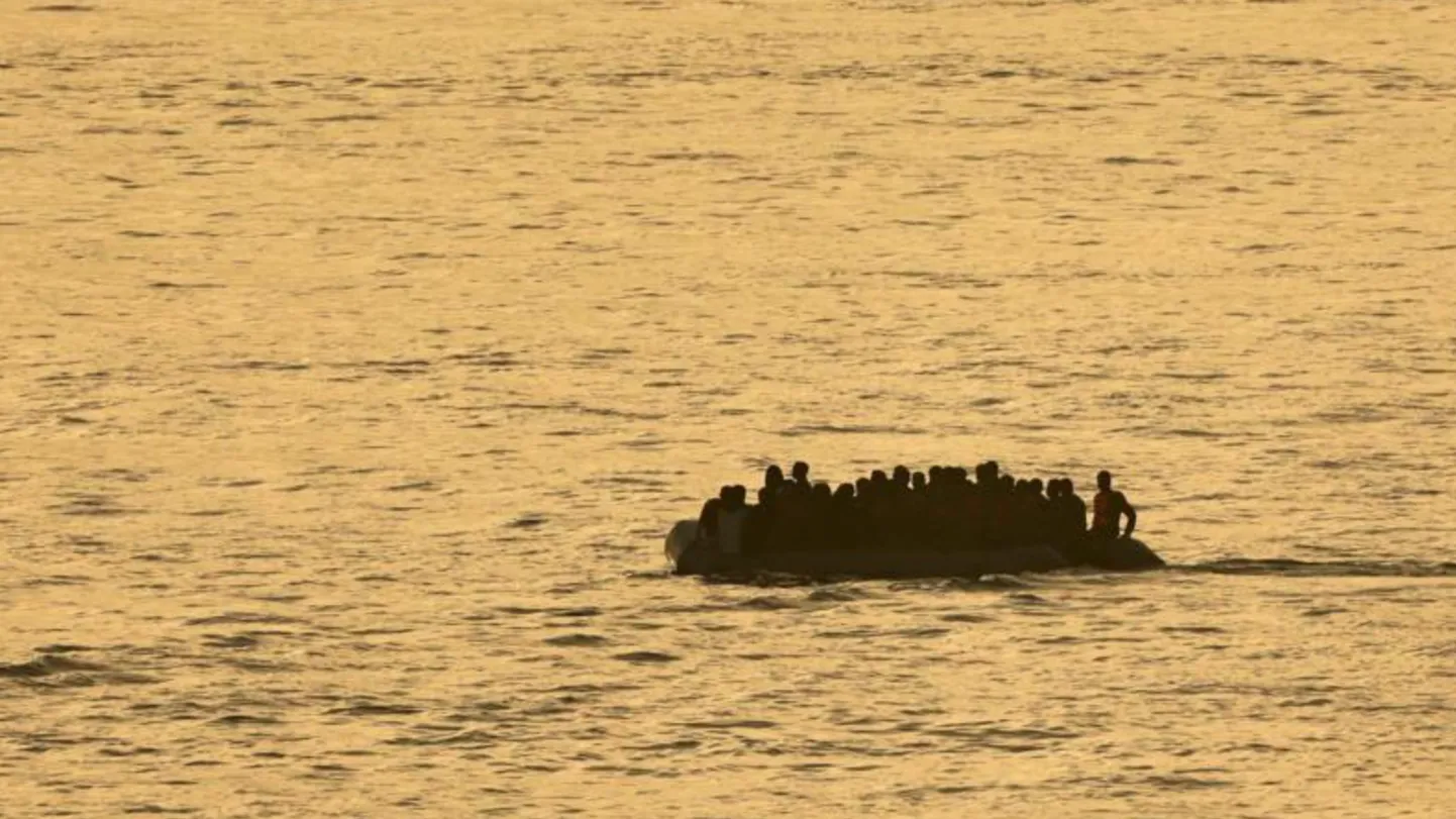 Беженцы на лодке.