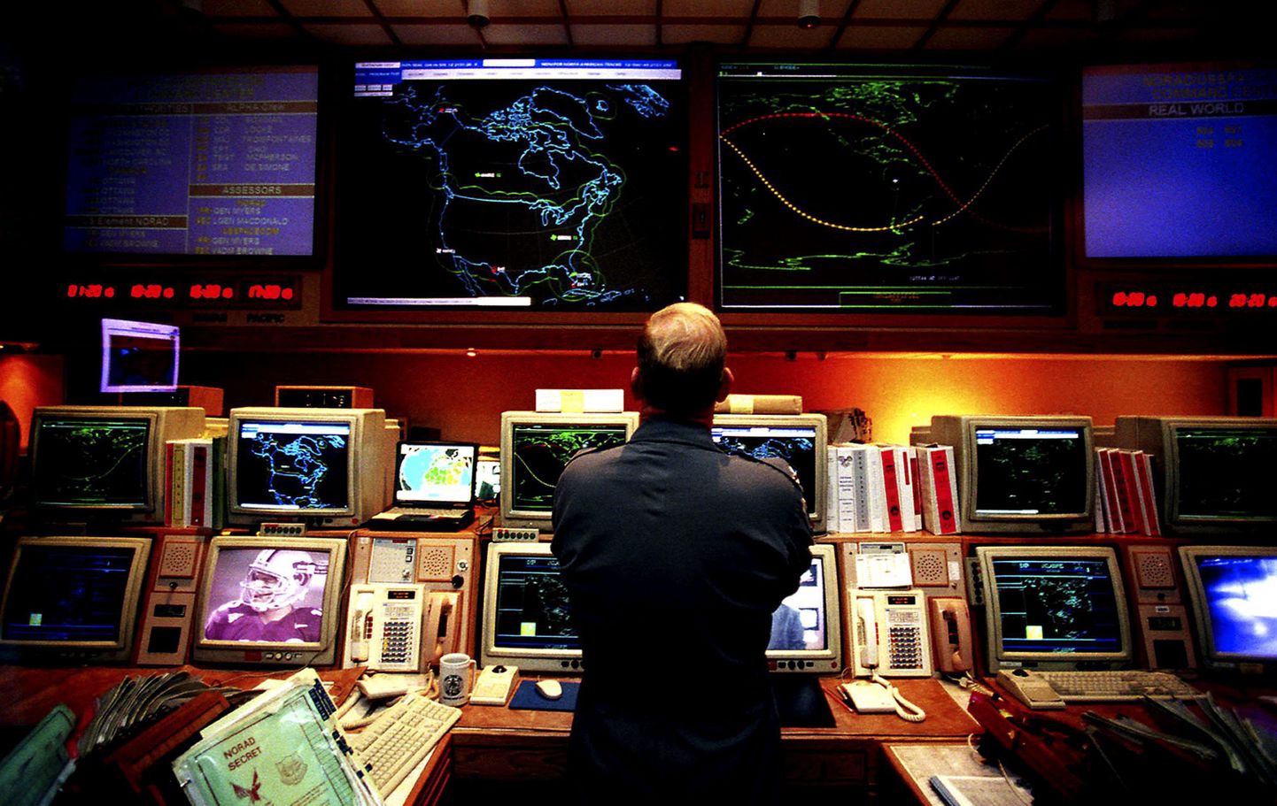 Colorado: A U.S. commander, sheltered from any potential nuclear missile attacks, stands watch three days before Y2K at the North American Aerospace Defense Command (NORAD) in the Cheyenne Mountain Complex, Wednesday, December 29, 1999. The complex is an underground combat operations center near Colorado Springs. The joint U.S.-Canadian center is monitoring the turn of the millenium closely because of the potential threat of errant nuclear missile launches caused by Y2K.