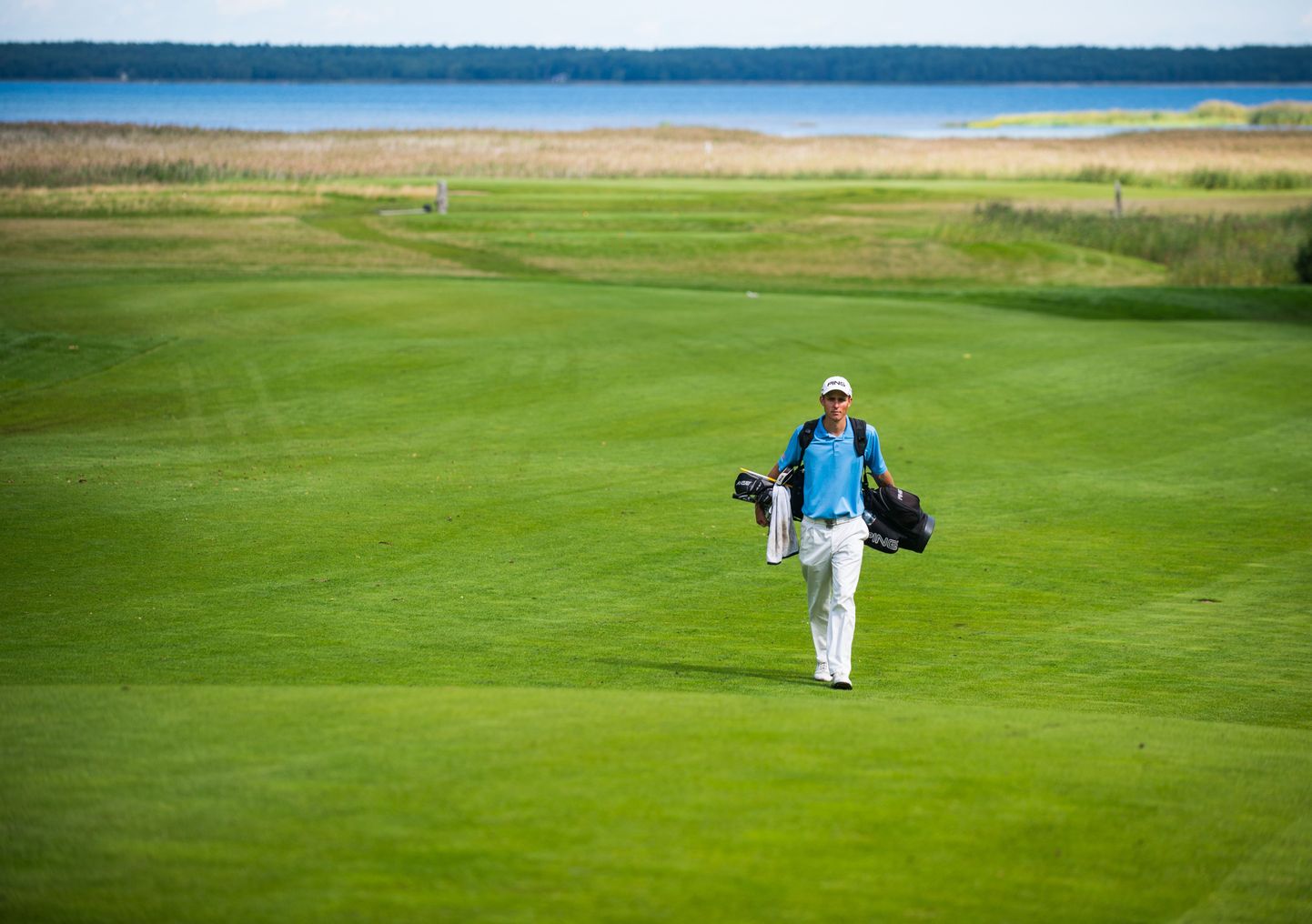 Golfimängija Mark Suursalu Jõelähtme golfikeskuses.