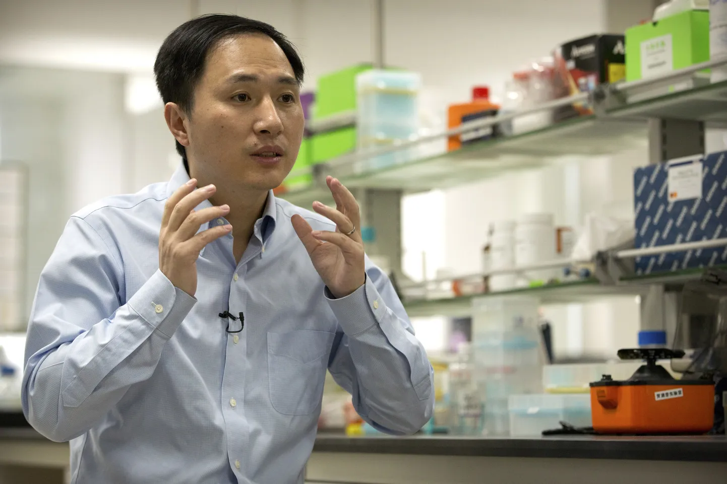 In this Oct. 10, 2018 photo, He Jiankui speaks during an interview at a laboratory in Shenzhen in southern China's Guangdong province. Chinese scientist He claims he helped make world's first genetically edited babies: twin girls whose DNA he said he altered. He revealed it Monday, Nov. 26, in Hong Kong to one of the organizers of an international conference on gene editing. (AP Photo/Mark Schiefelbein)