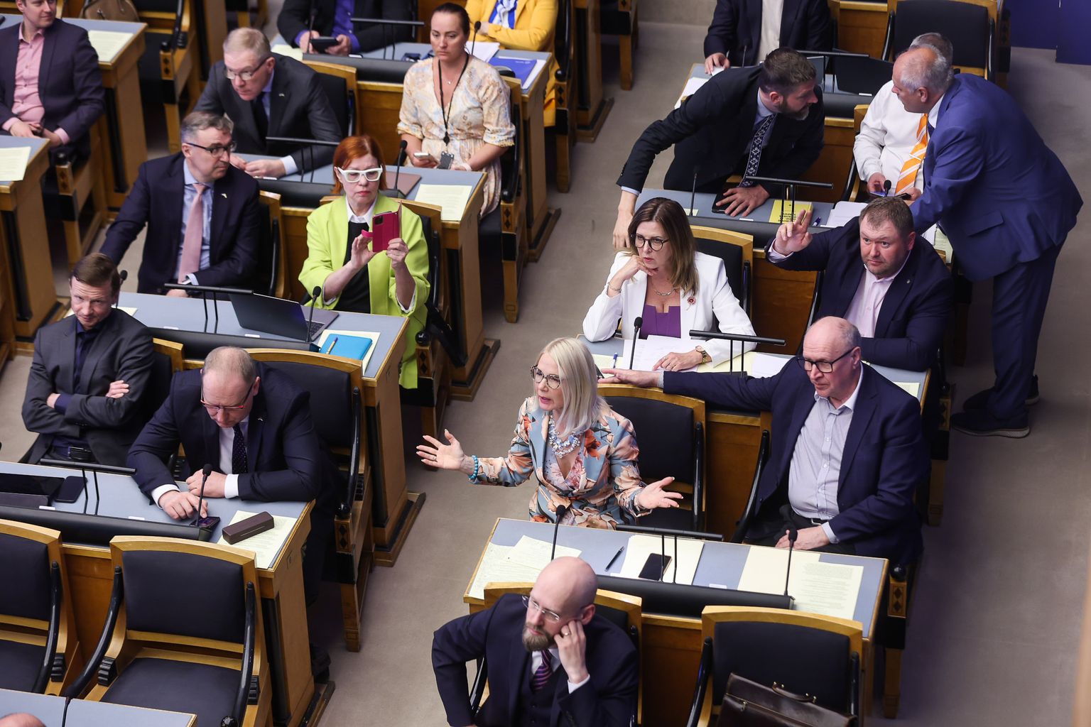 MPs from the opposition parties Estonian Conservative People's Party (EKRE), Center Party and Isamaa walked out of the session hall of the parliament in protest late on Monday evening.