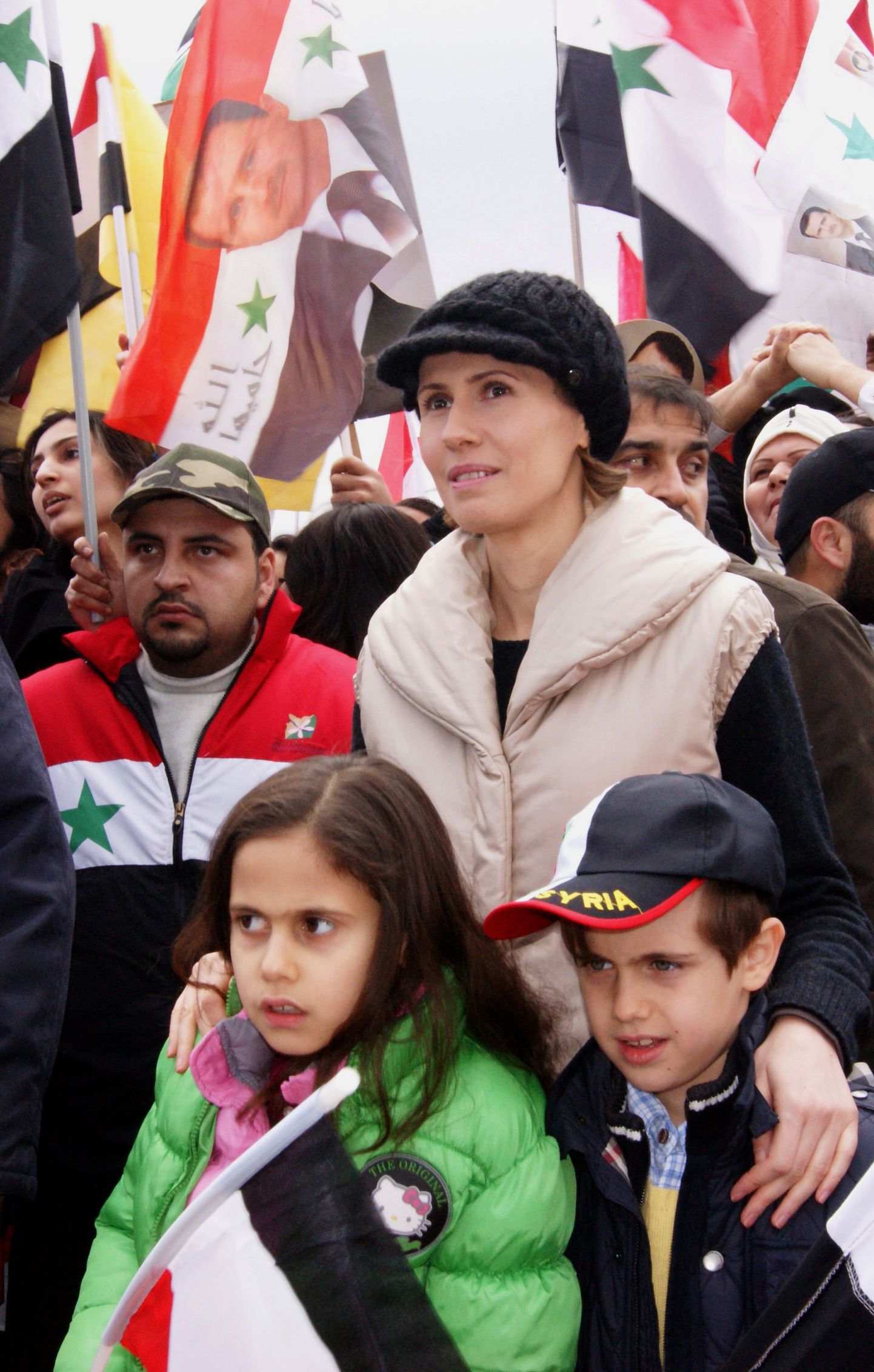 Süüria esileedi Asma al-Assad koos laste Karimi (paremal) ja Zeiniga.