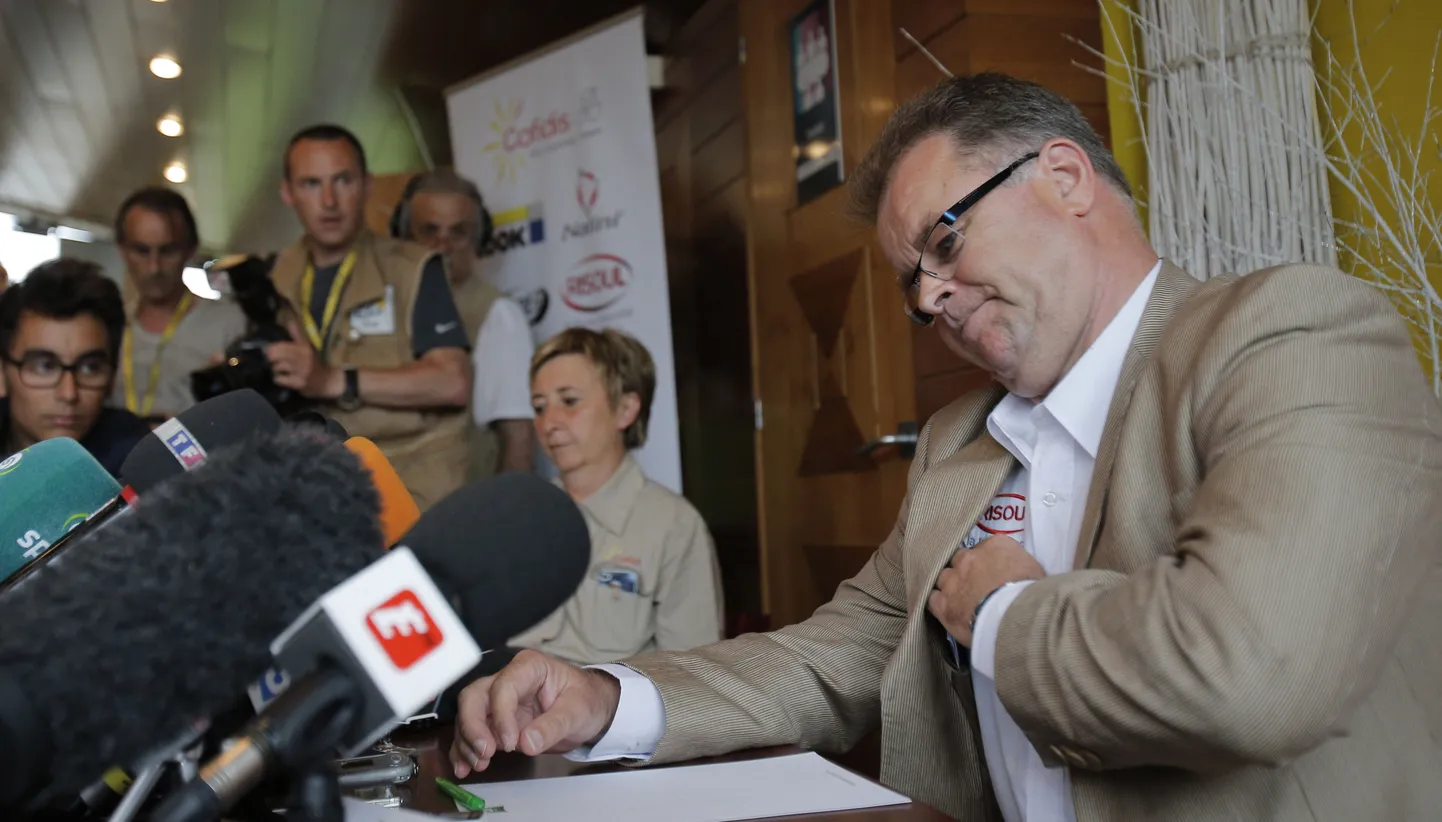 Yvon Sanquer, general manager of the Cofidis cycling team answers question of reporters following the arrest of one of the team's riders during a press conference on he rest day of the Tour de France cycling race in Saint Albain, north of Macon, France, Tuesday July 10, 2012. Cofidis rider Remy Di Gregorio of France has been arrested at his team hotel in connection with a Tour de France doping investigation and suspended by his team. (AP Photo/Christophe Ena) / SCANPIX Code: 436