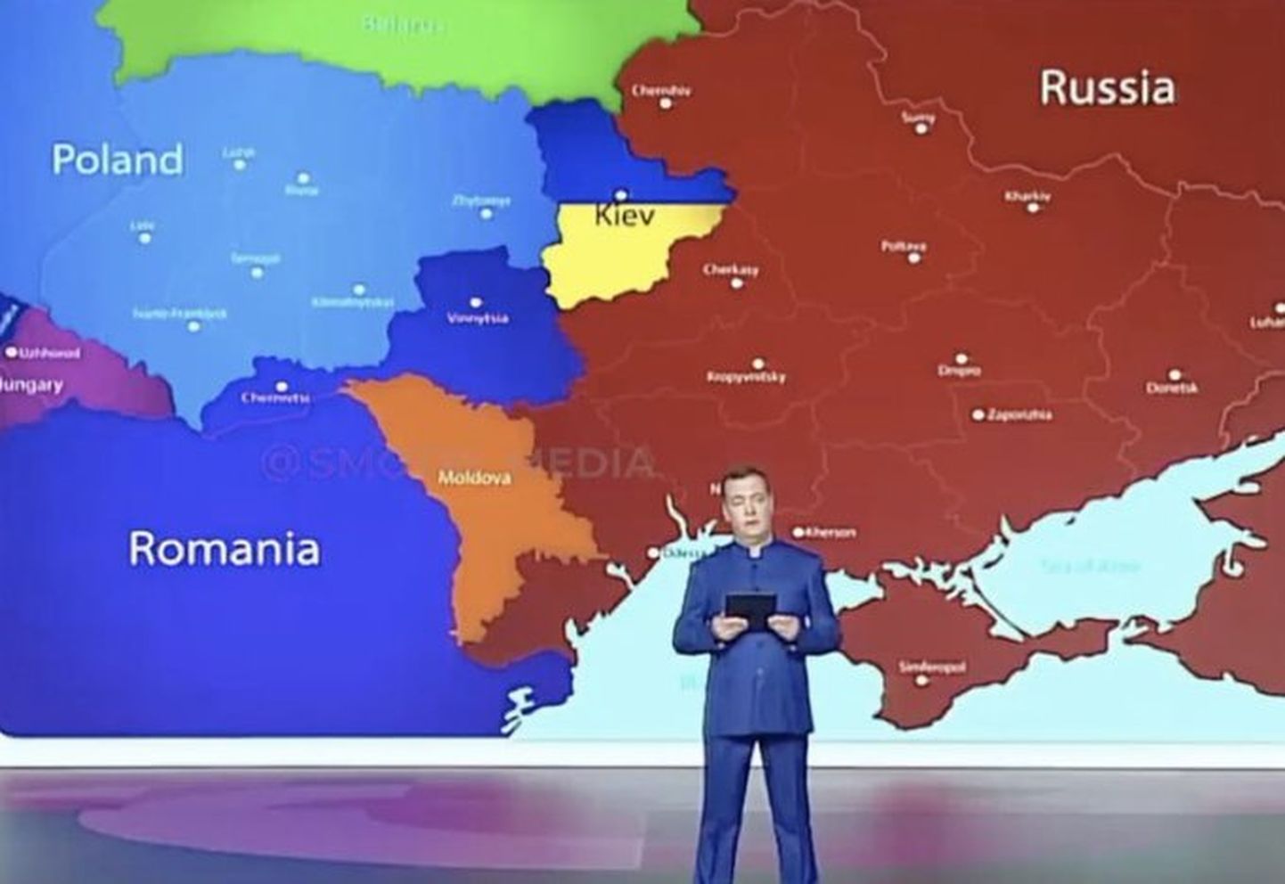 Медведев на фоне придуманной карты