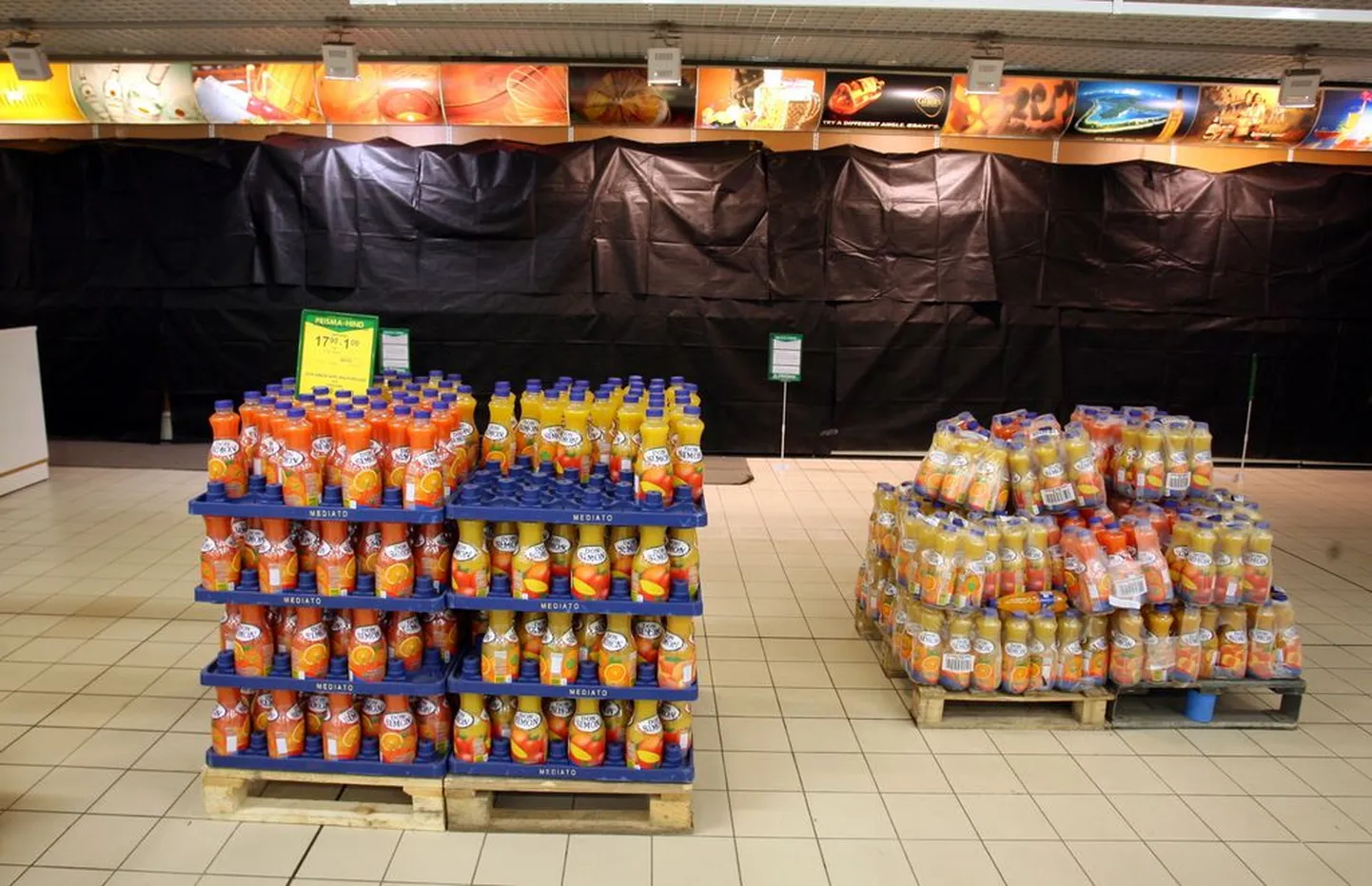 Pildil on Kristiine Prisma kinni kaetud alkoholiletid.