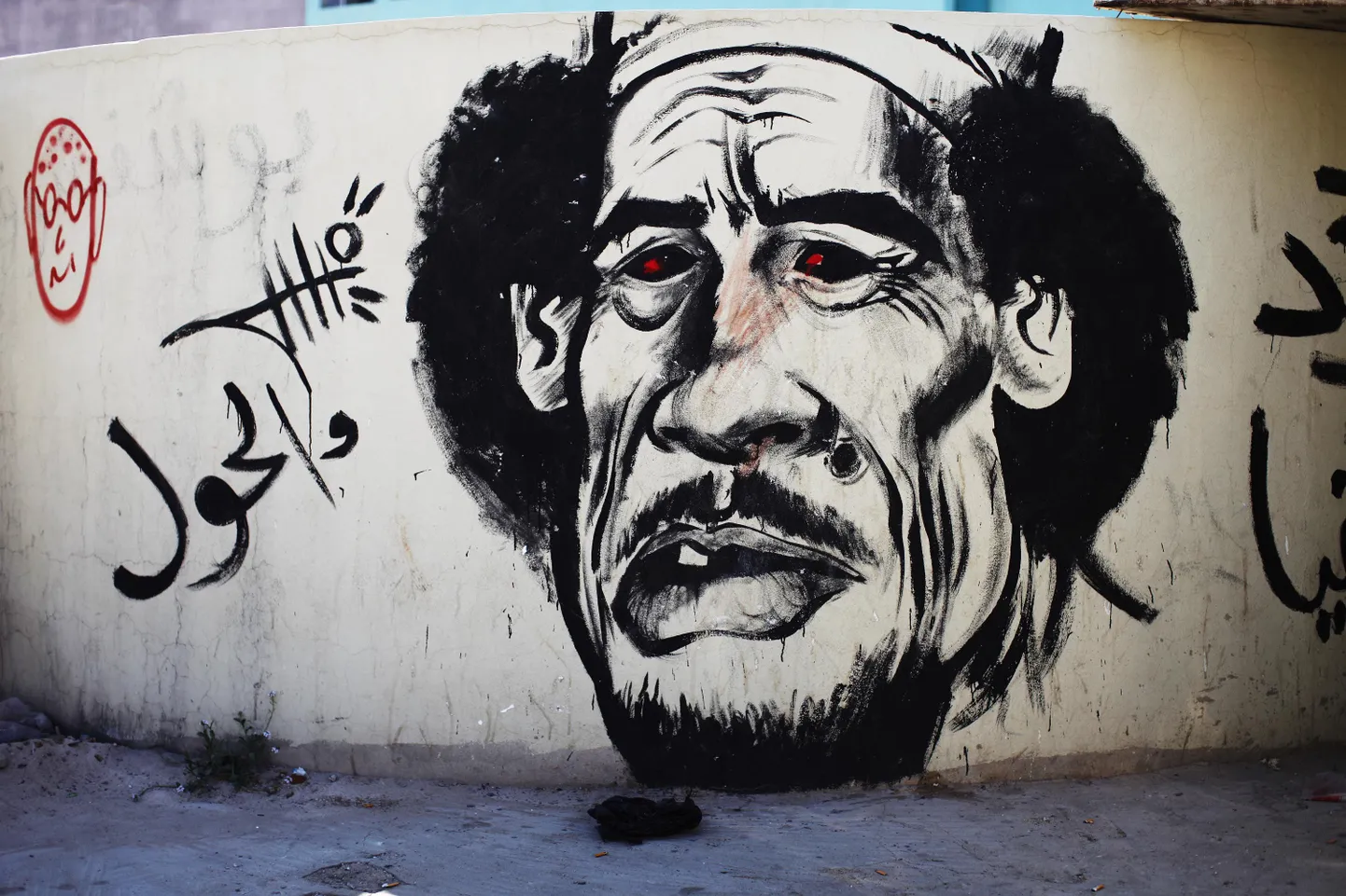 Граффити, созданное противниками Муаммара Каддафи в Бенгази.