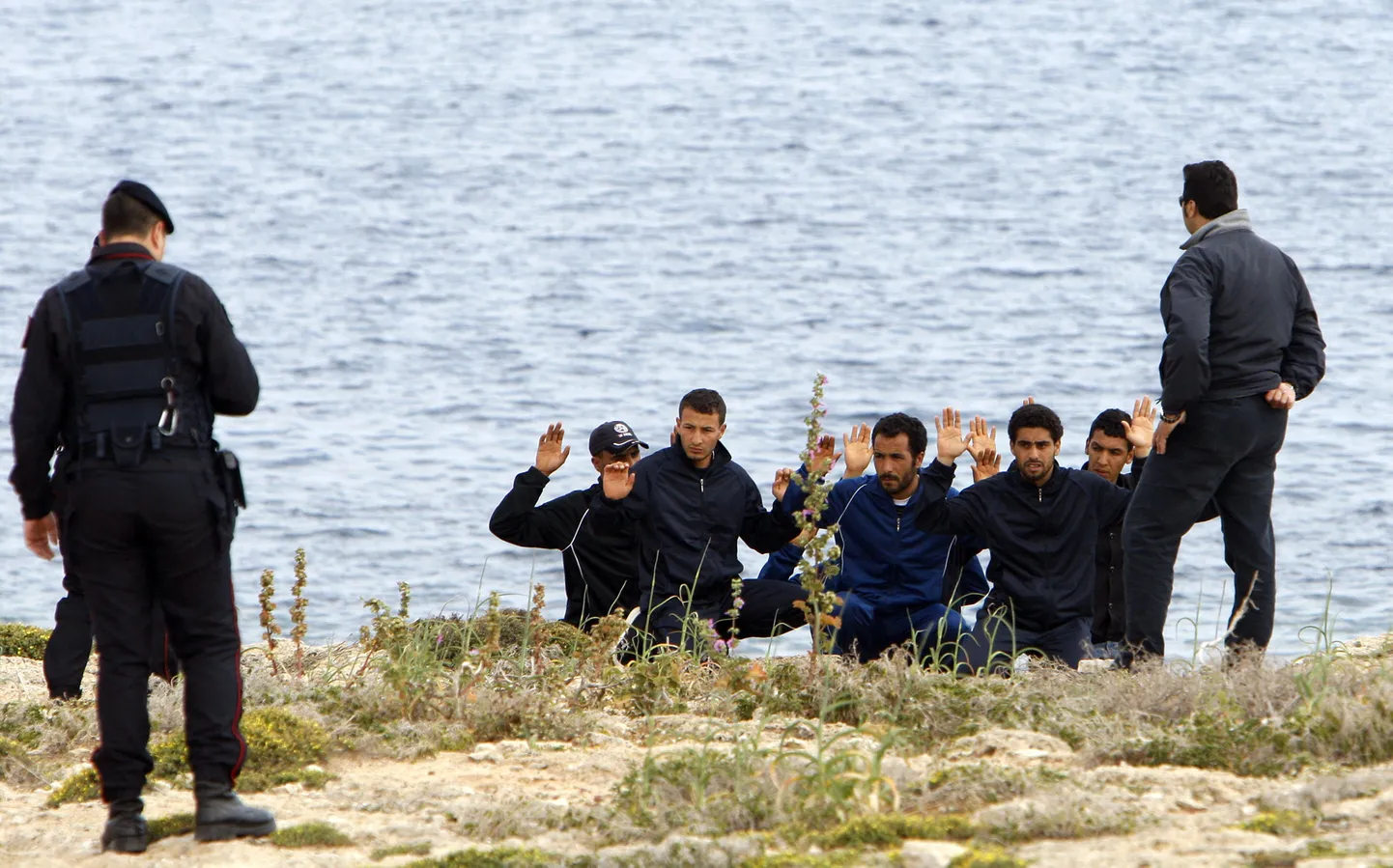 Тунисские беженцы в Италии