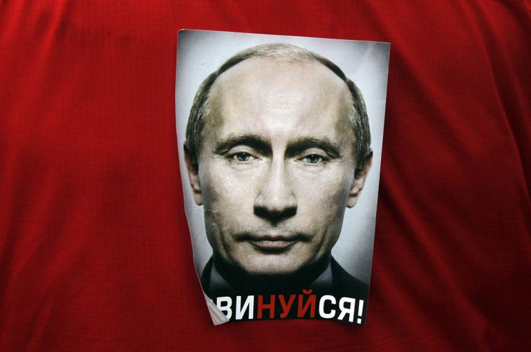 Putini pildiga särk, mis käsib kuuletuda. 