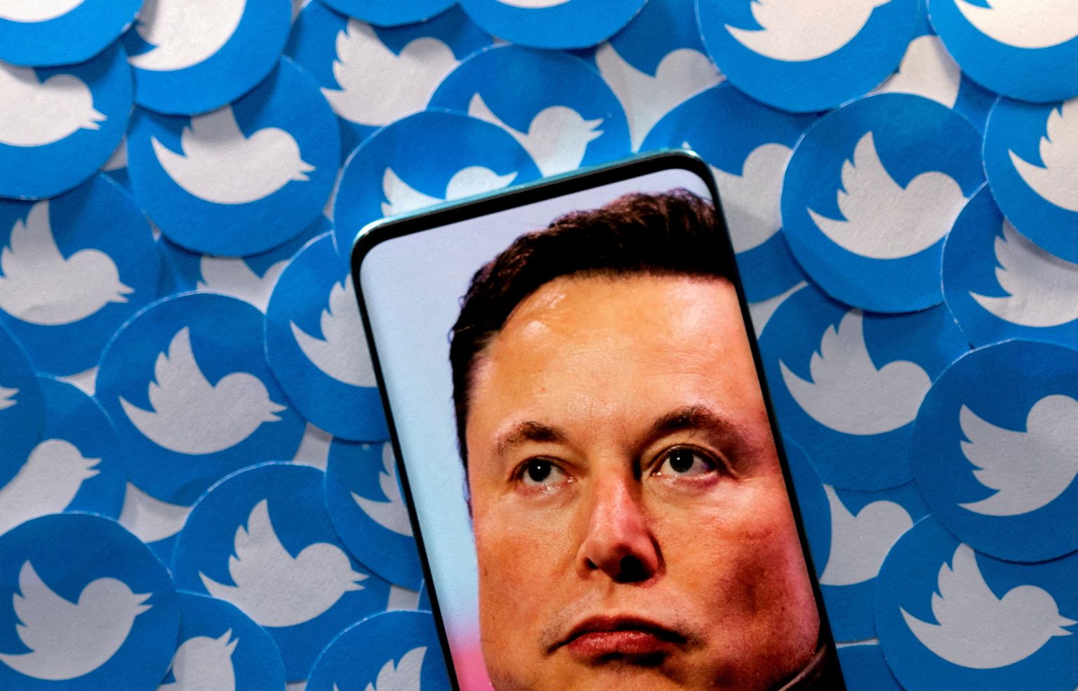 Elon Musk ja Twitteri logod