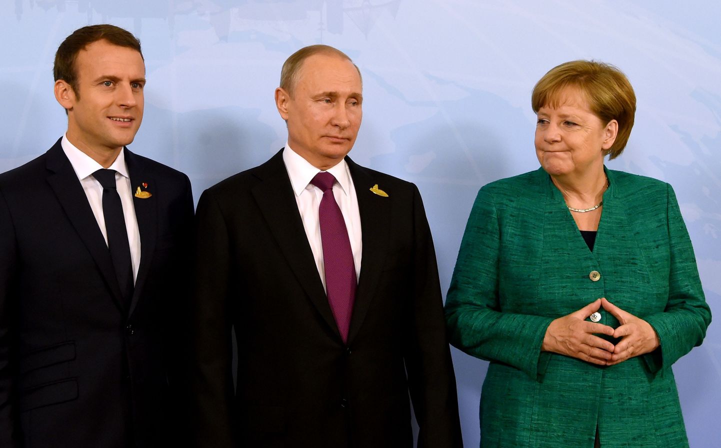Emmanuel Macron (vasakul), Vladimir Putin ja Angela Merkel G20 tippkohtumisel eelmisel aastal.