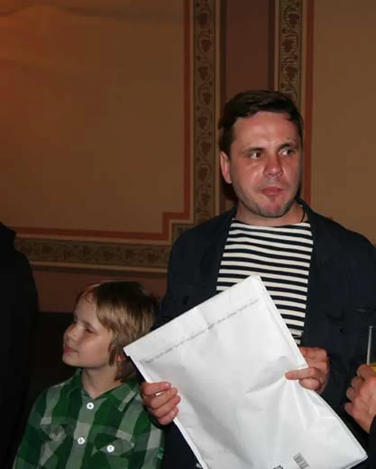 Komponists Andris Dzenītis ar dēlu Krišu operas "Dauka" pirmizrādes ballē