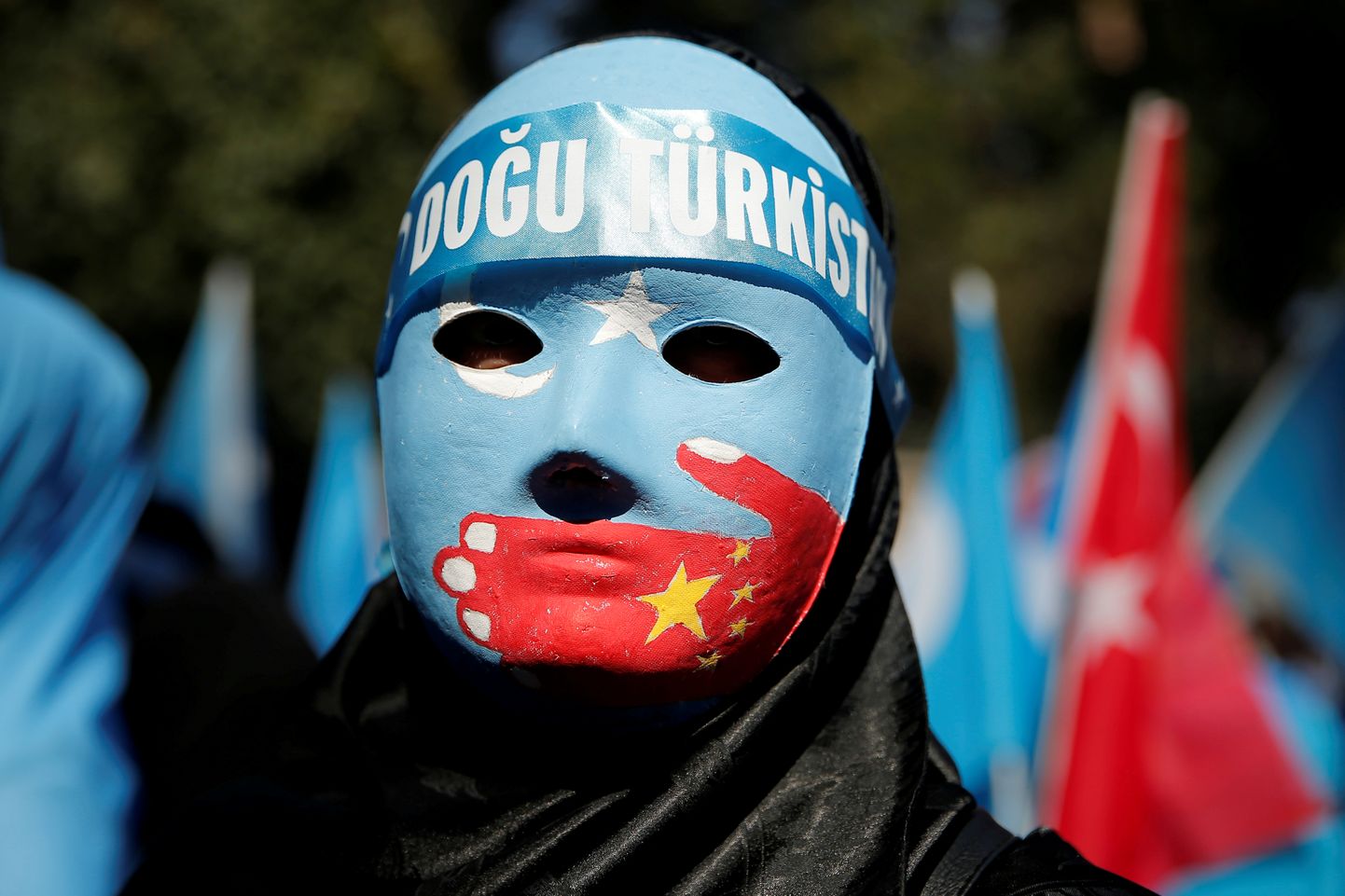 Uiguuri meeleavaldaja.