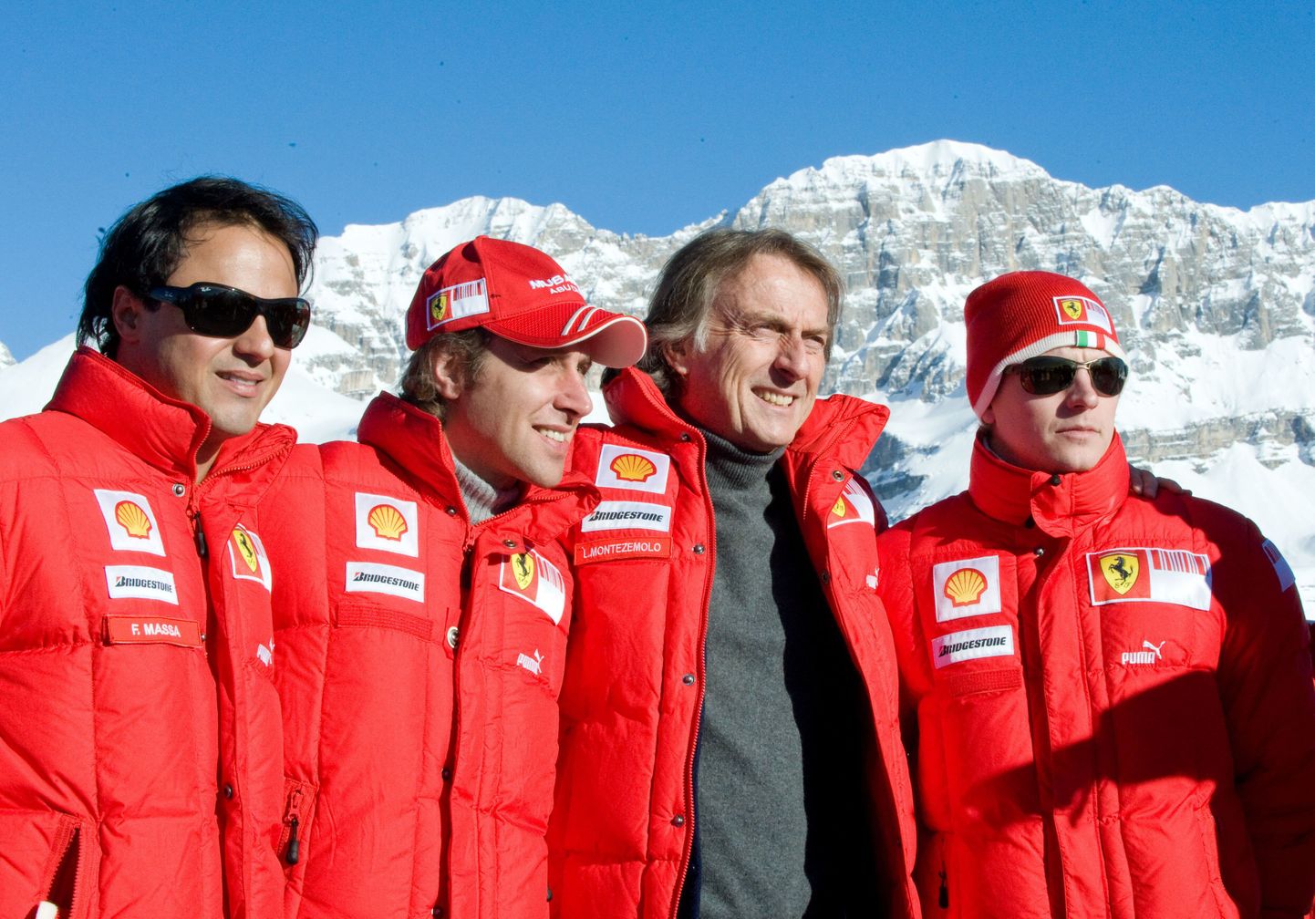 Ferrari president Luca di Montezemolo (keskel) ja Kimi Räikkönen.